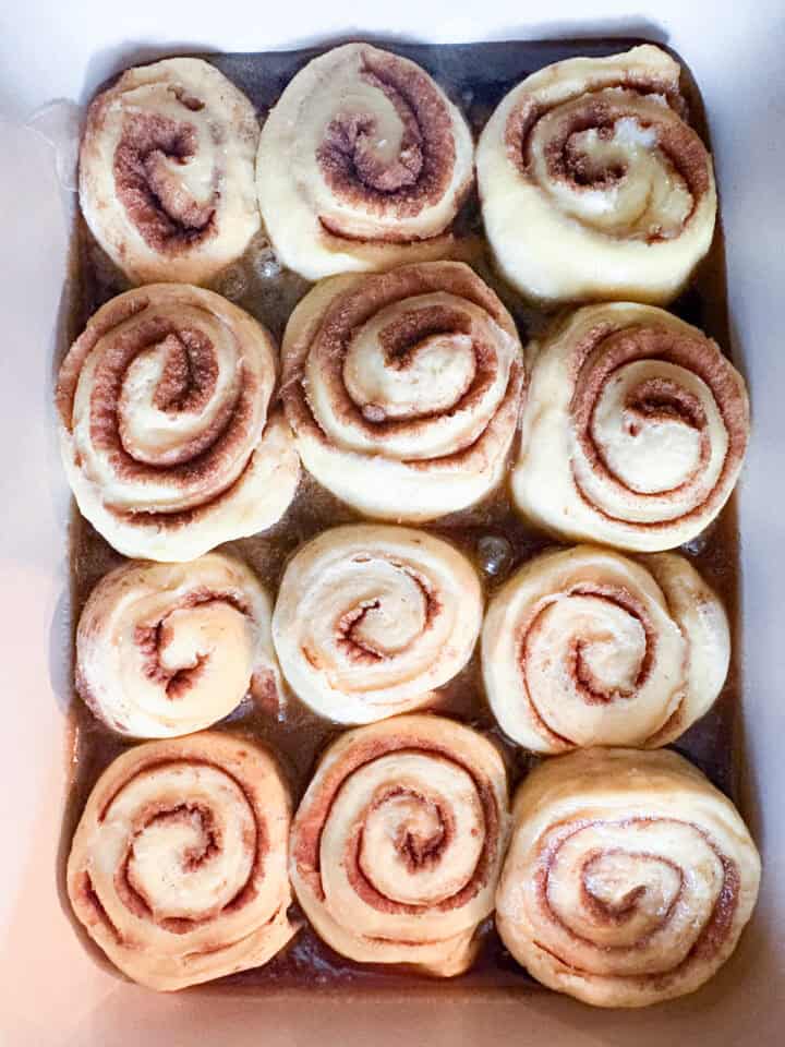 My homemade sticky buns recipe is make-ahead friendly and amazingly good! A thick maple syrup topping turns these into a bakery-worthy treat. Sticky buns after proofing.