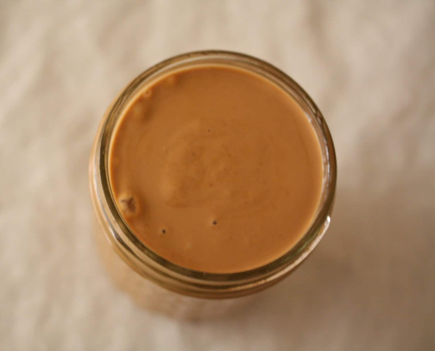 A jar of peanut sauce.