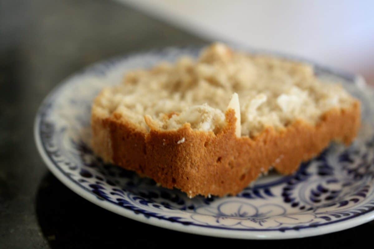 A slice of coconut loaf cake.