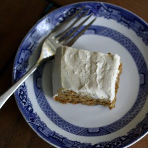 Gluten-free pumpkin cake with cream cheese frosting.