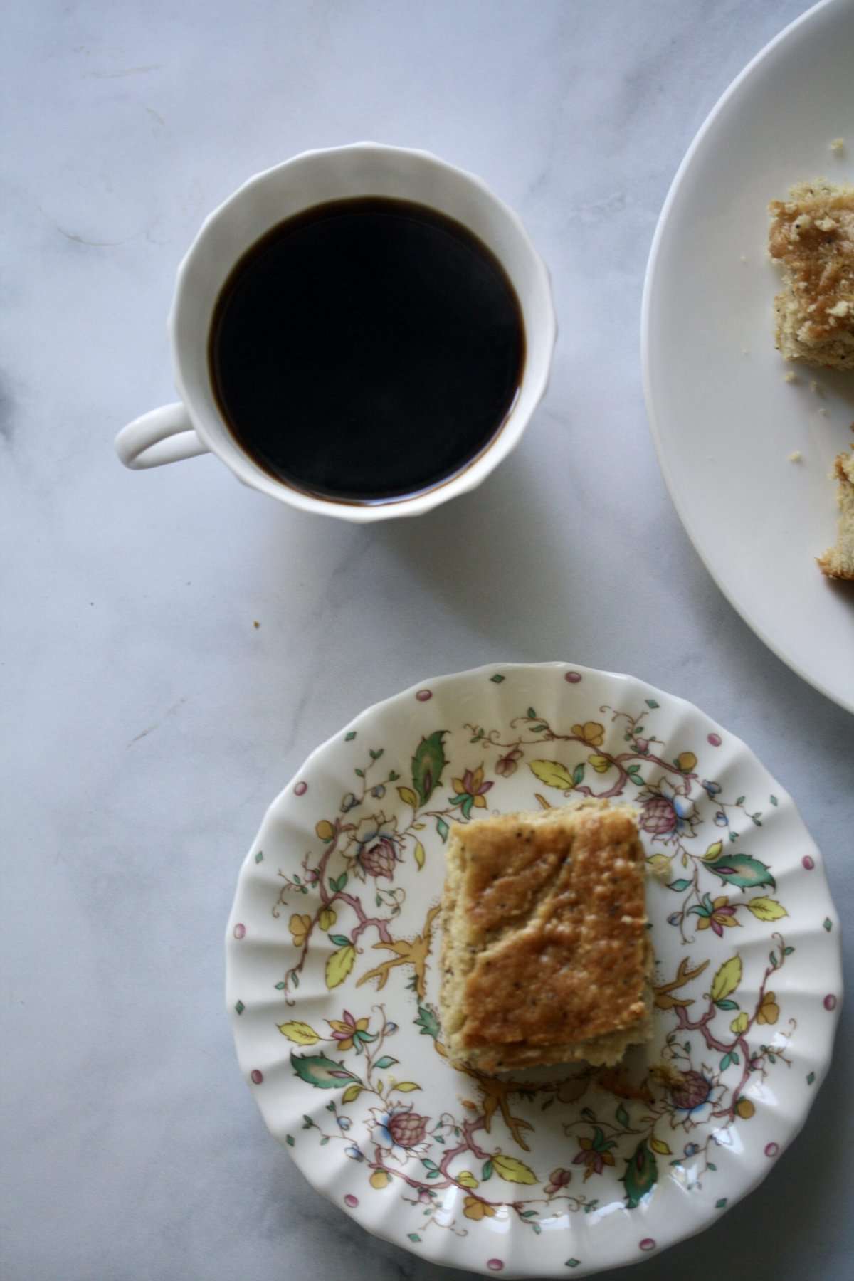 Gluten-free Meyer lemon snack cake and a cup of coffee.