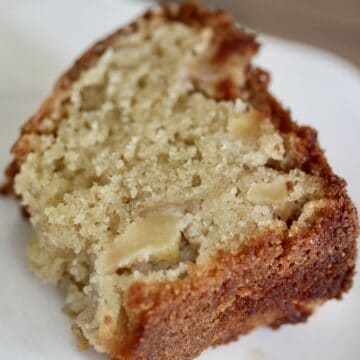A close up shot of a slice of pear cake.