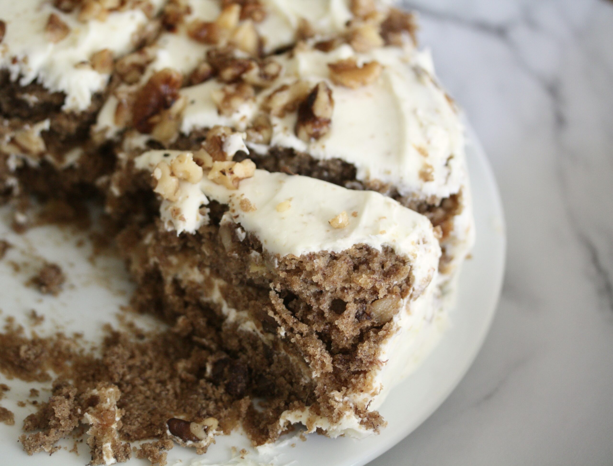 Slices of gluten-free hummingbird cake on a plate.
