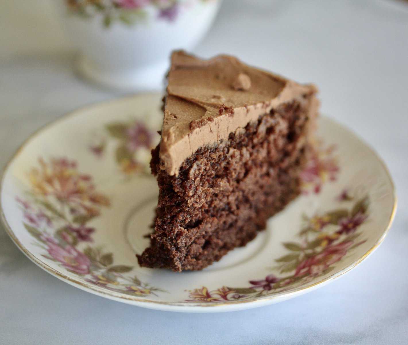 A slice of gluten-free chocolate dump-it cake on a plate.