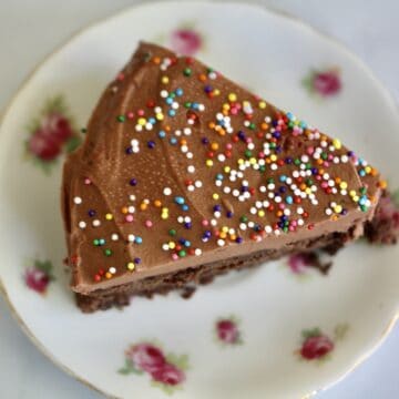 Slice of one bowl gluten-free birthday topped with sprinkles