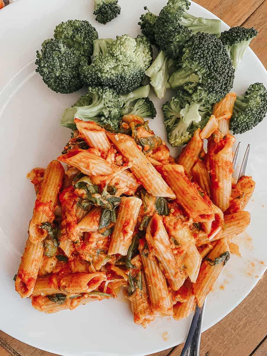 a portion of gluten free pasta bake with broccoli on a plate