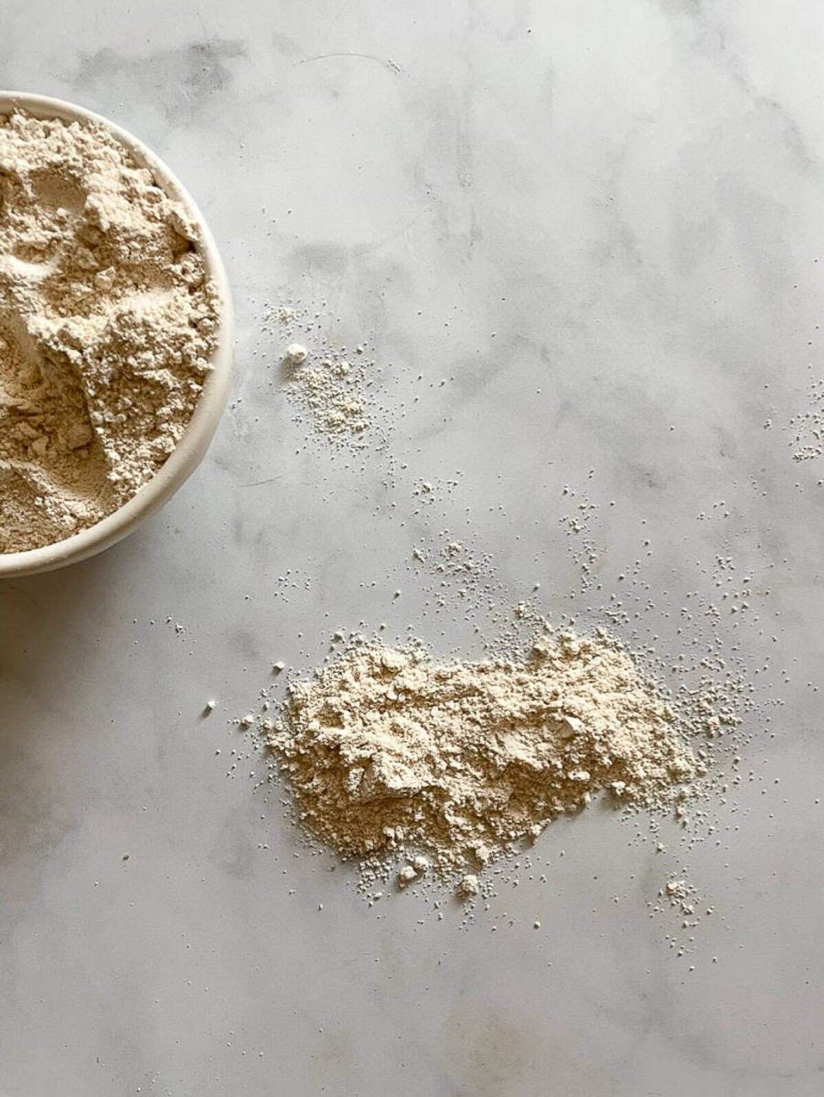 Oat flour on a white background.