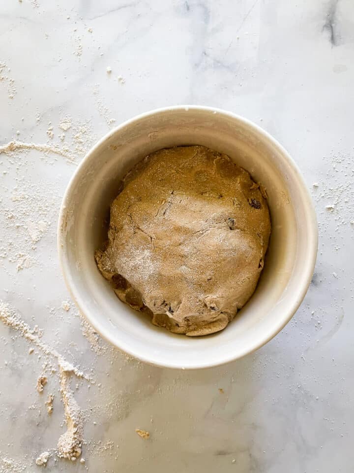 The bram brack dough rises in a bowl.