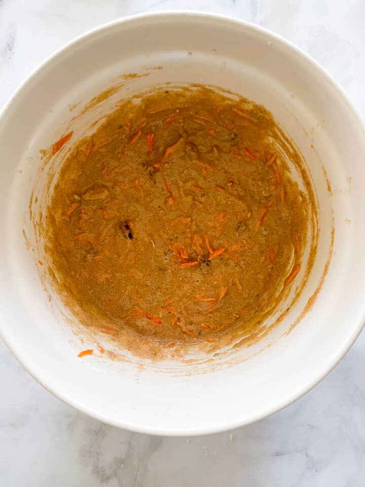 The mixed batter for gluten free carrot cake is shown.