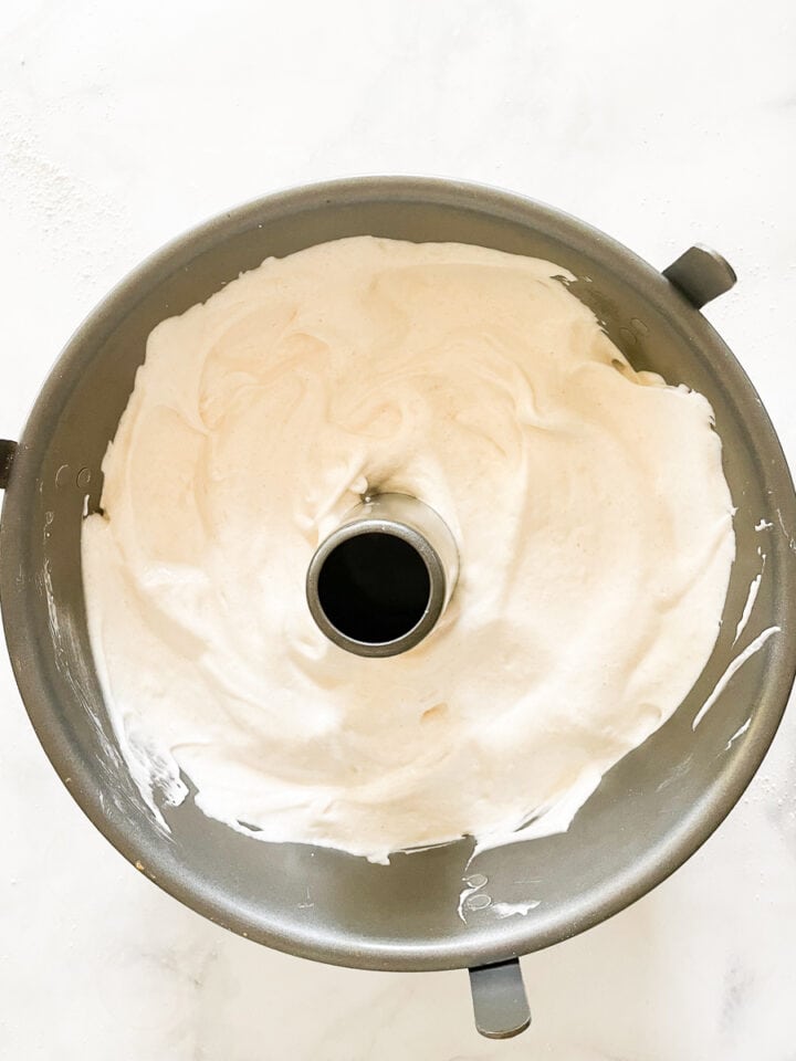 The gluten free angel food cake batter is placed in the tube pan.