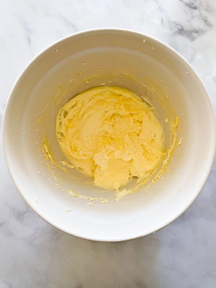 Eggs are added to the creamed mixture.