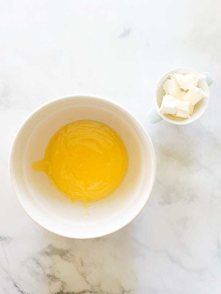 The strained lemon curd in a bowl.