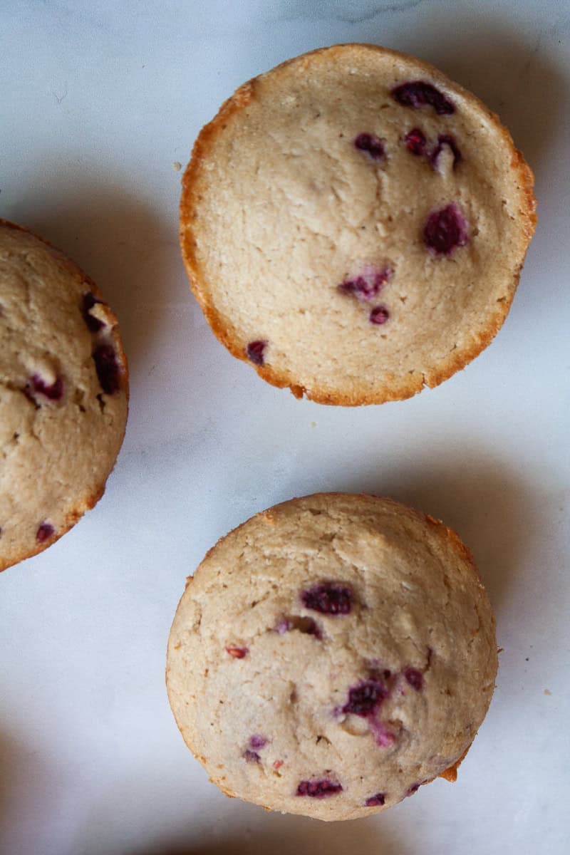 A close up detail of raspberry muffins.
