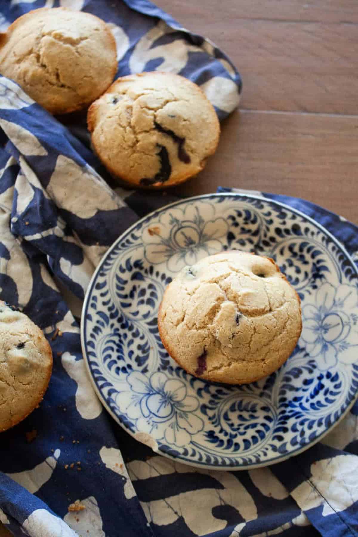 Oat flour blueberry muffins on a table.