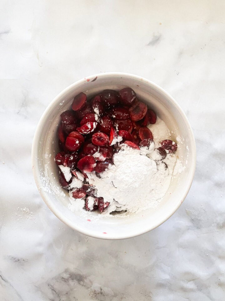 Arrowroot is added to the cherries along with sugar and lemon juice.