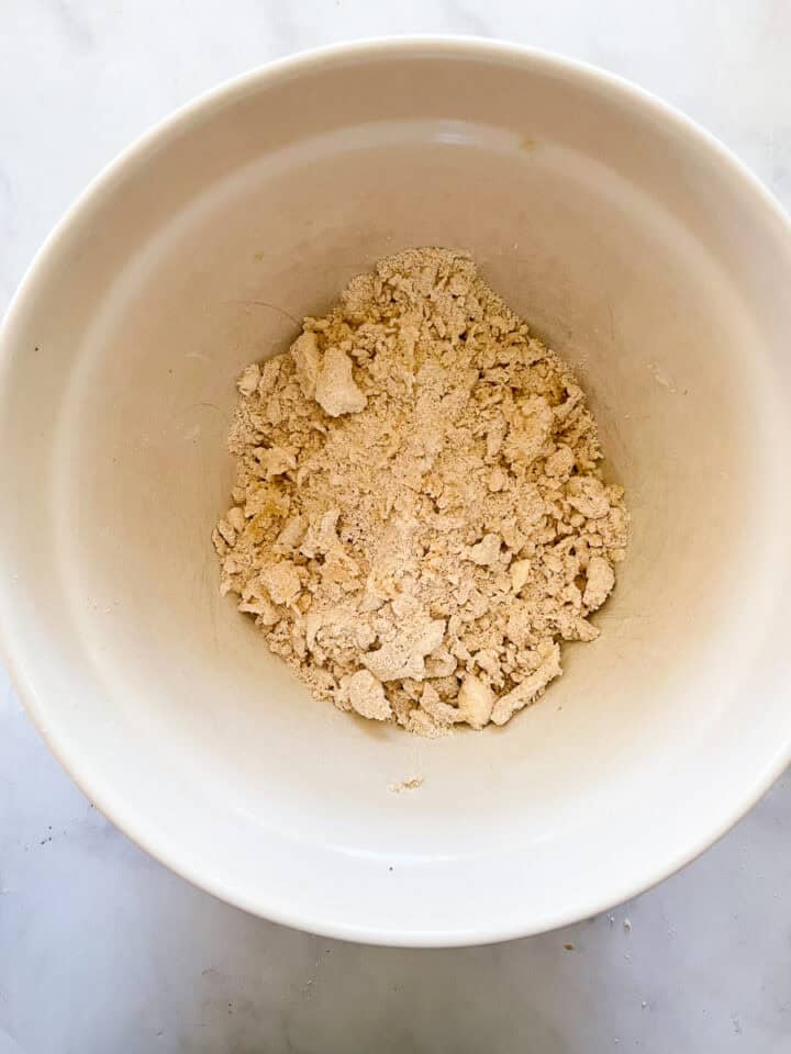 After the butter is rubbed in the dough resembles coarse meal.