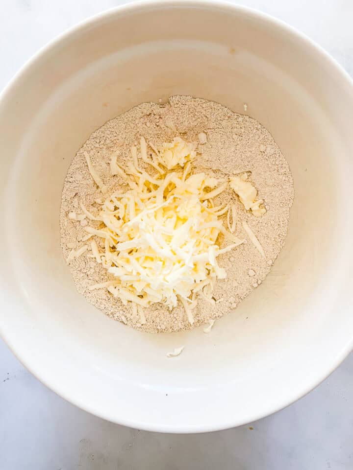 Cold butter is grated in.