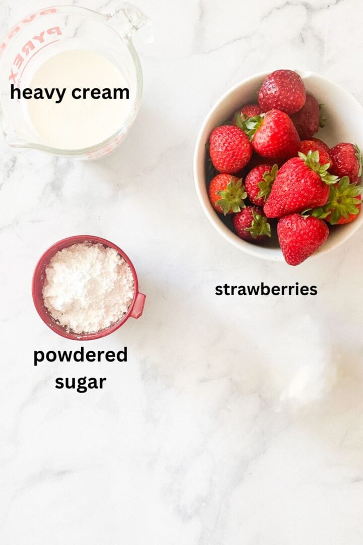 Heavy cream, strawberries, and powdered sugar are portioned out and labelled.