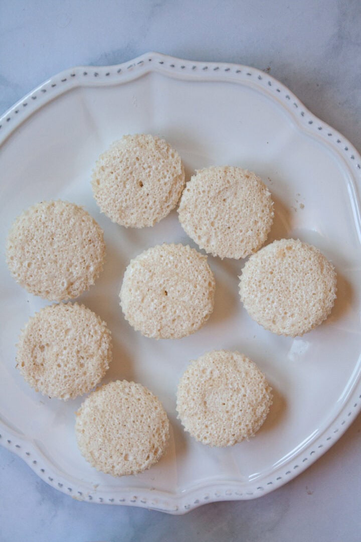 Gluten free angel food cupcakes on a white plate.