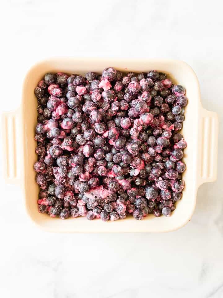 Blueberry crisp filling in a pan.