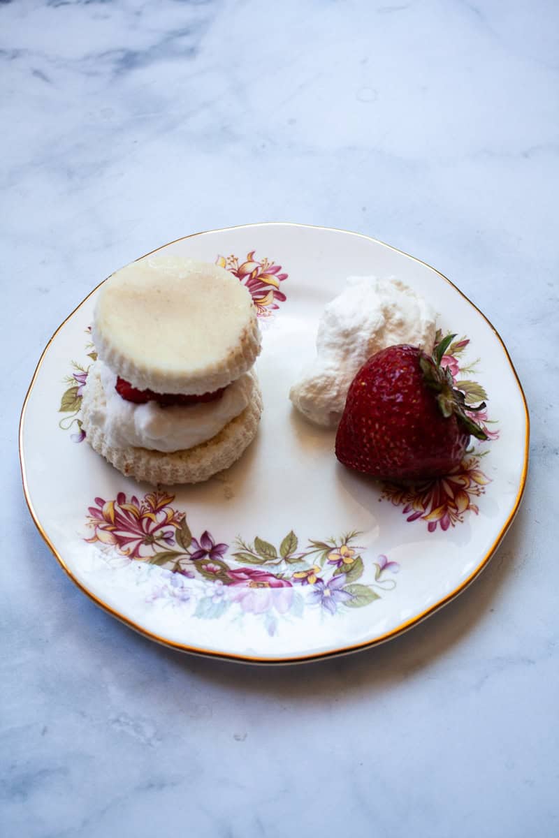 A gluten free strawberry shortcakes on a plate.