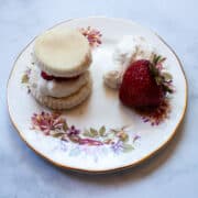 A gluten free strawberry shortcakes on a plate.