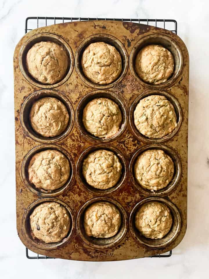 Gluten free banana zucchini muffins cool in the tin.