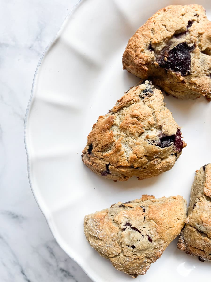 Oat flour scones on a cake plate.