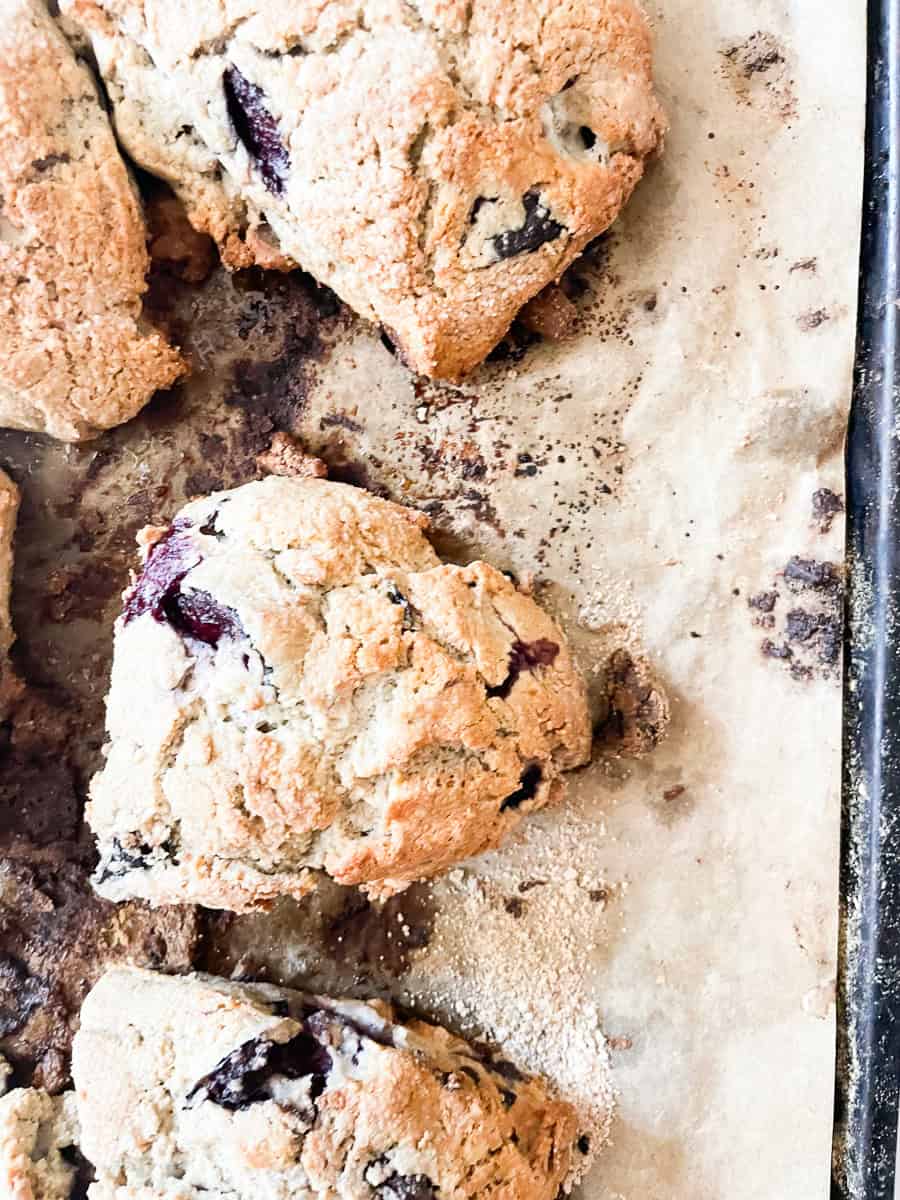 Gluten free scones on parchment paper.