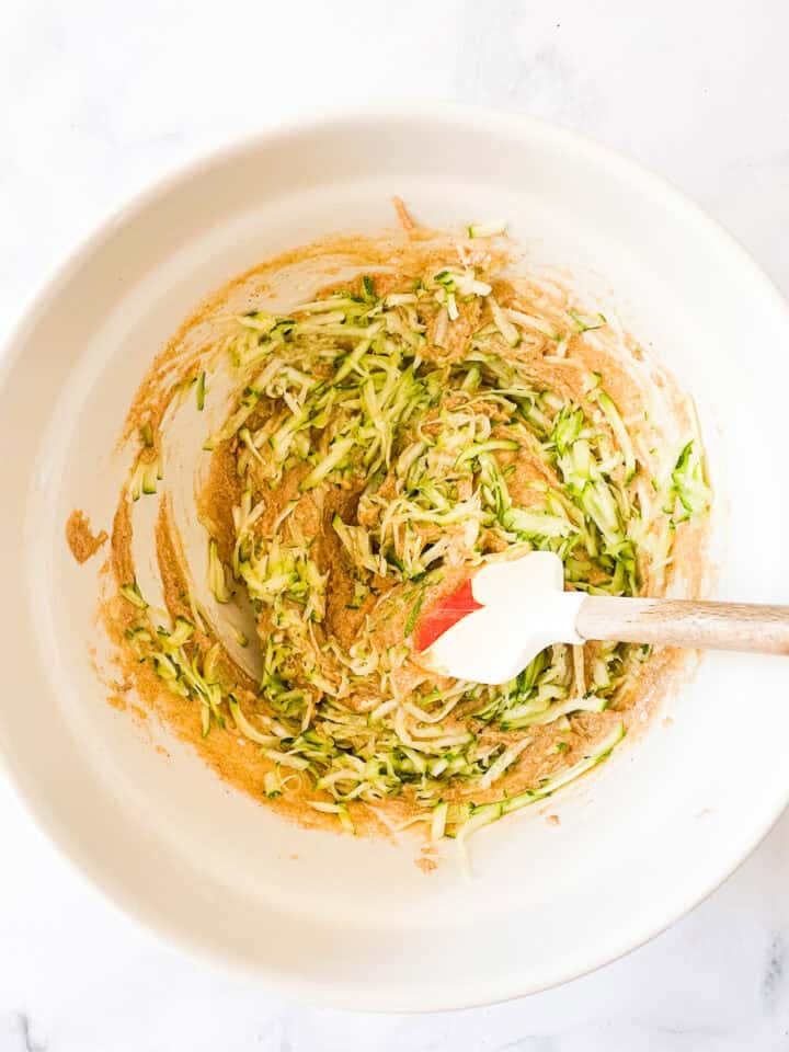 Zucchini is added to the bread batter.