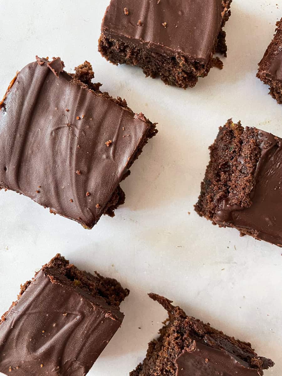 Squares of gluten zucchini chocolate cake.