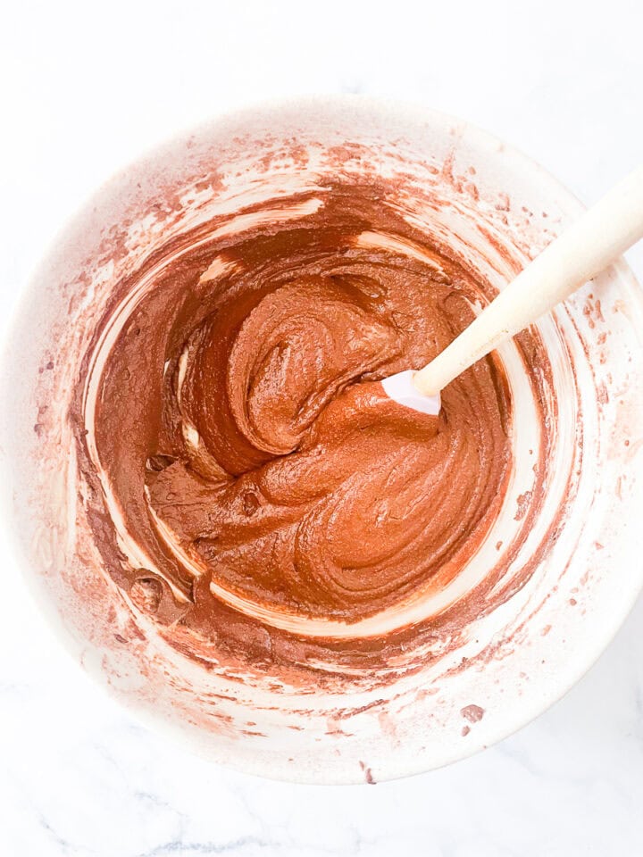 Cocoa powder is mixed in to the batter.