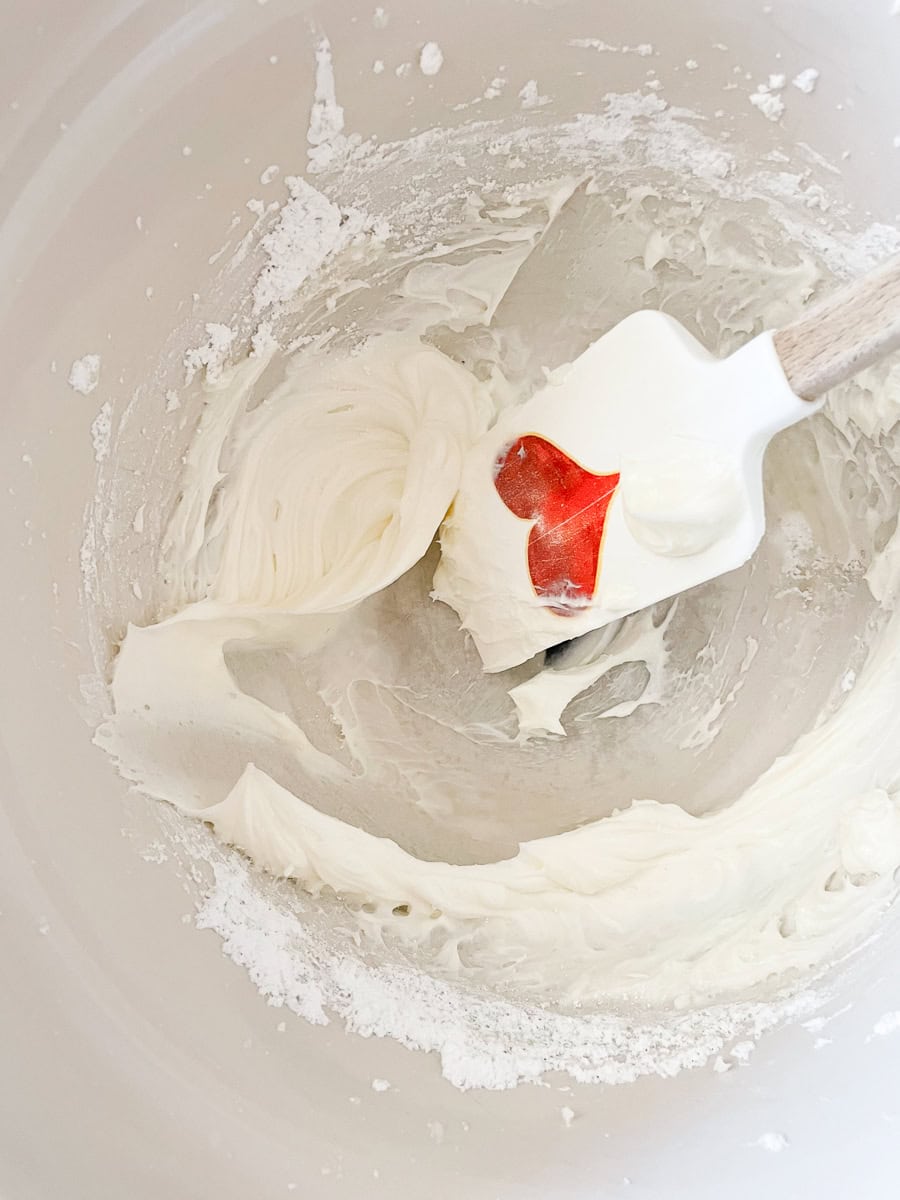 Vanilla icing in a bowl.