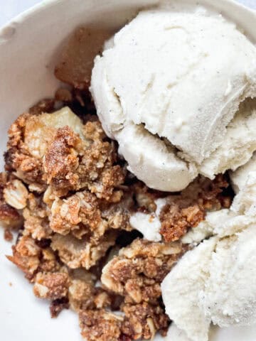 Ice cream tops apple crisp.