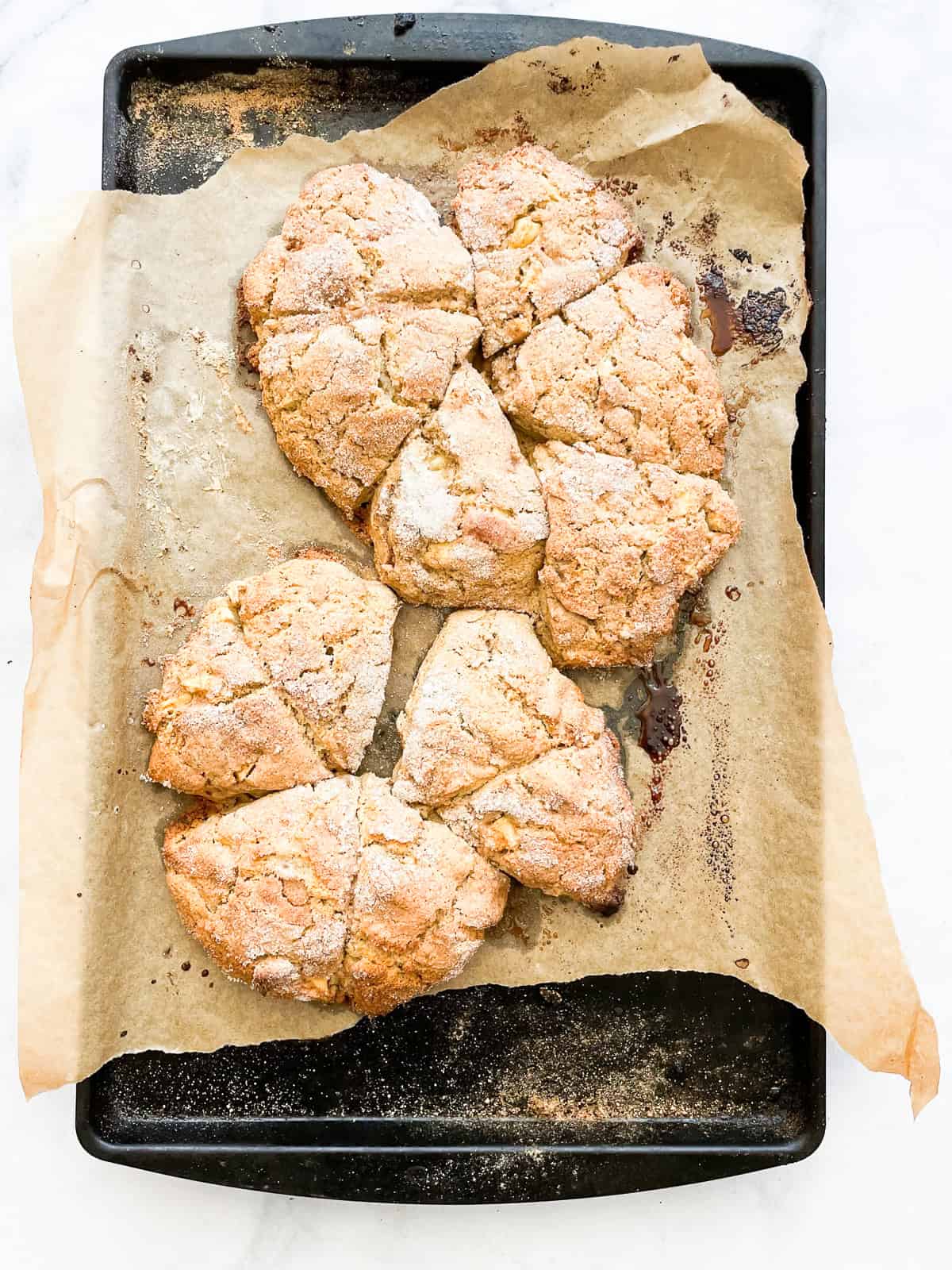 A tray of baked apple scones.