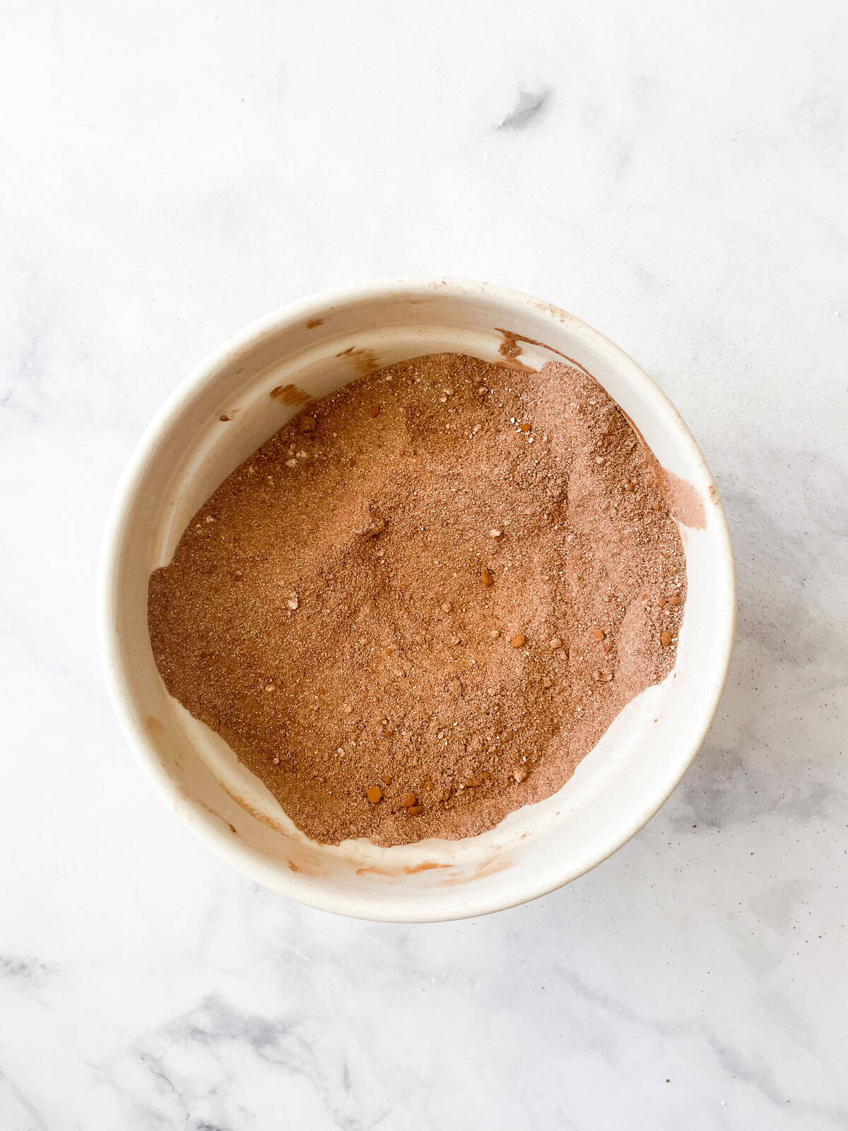 The dry mix for chocolate layer cake in a bowl.