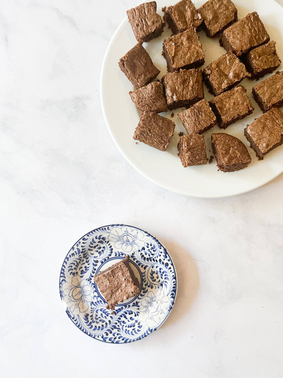 Whole wheat brownies on plates.