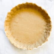 A gluten free all butter pie crust in a pie pan.