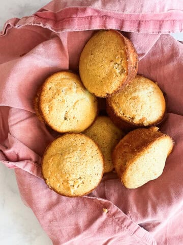 Cornbread muffins on a red napkin.