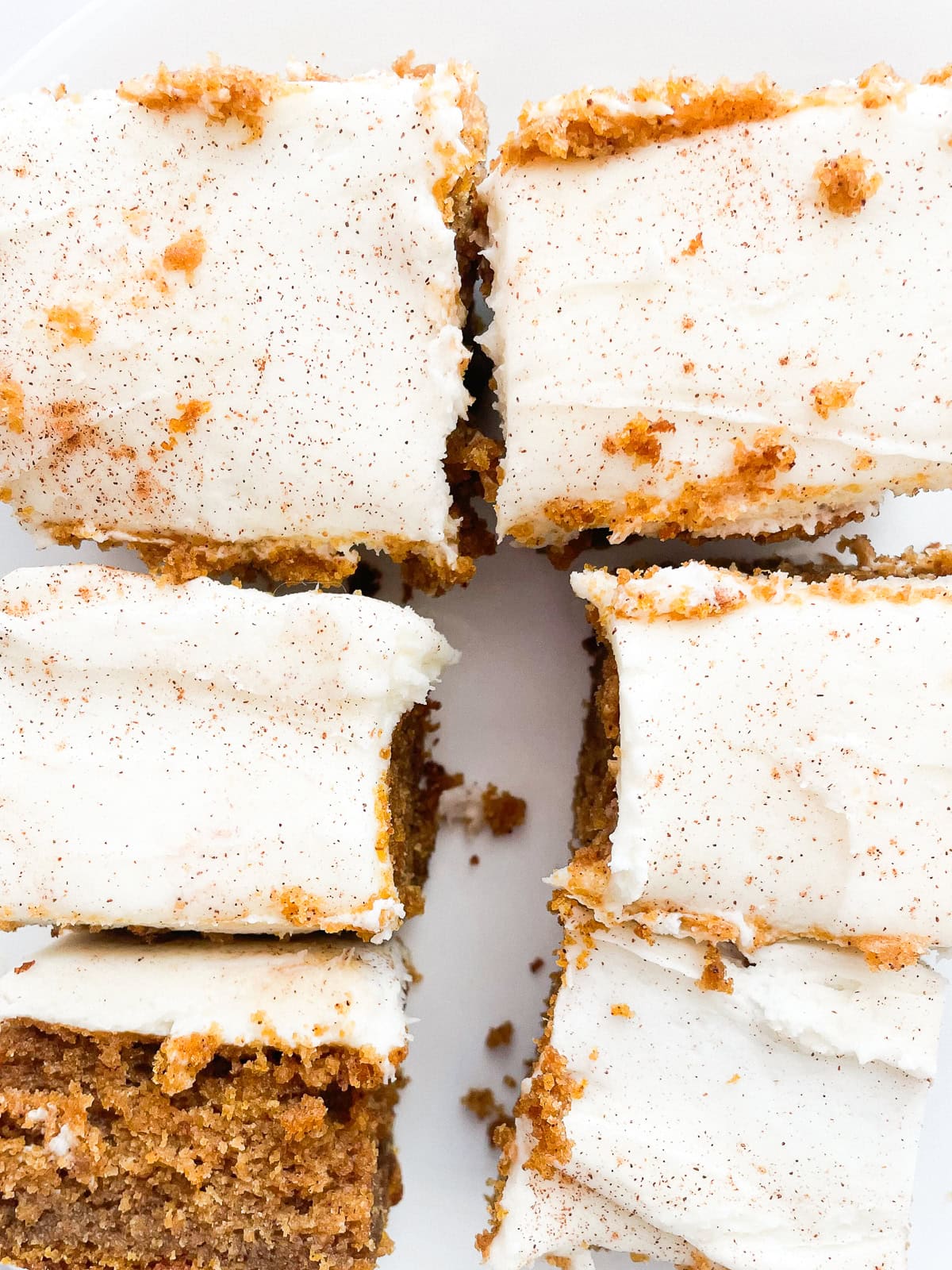 Cream cheese frosting topping pumpkin bars.