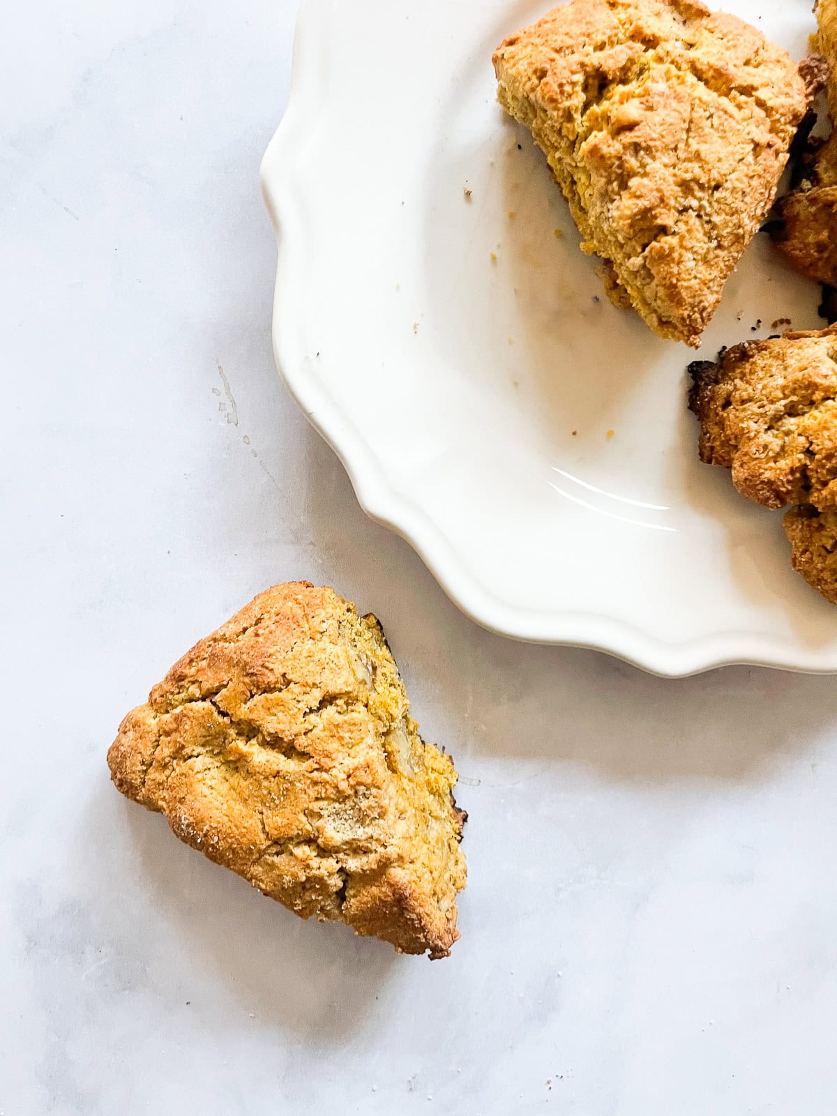 A plate of gluten free walnut pumpkin scones.