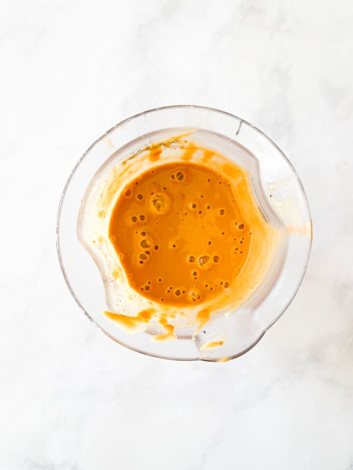 Pureed peanut sauce in a blender.