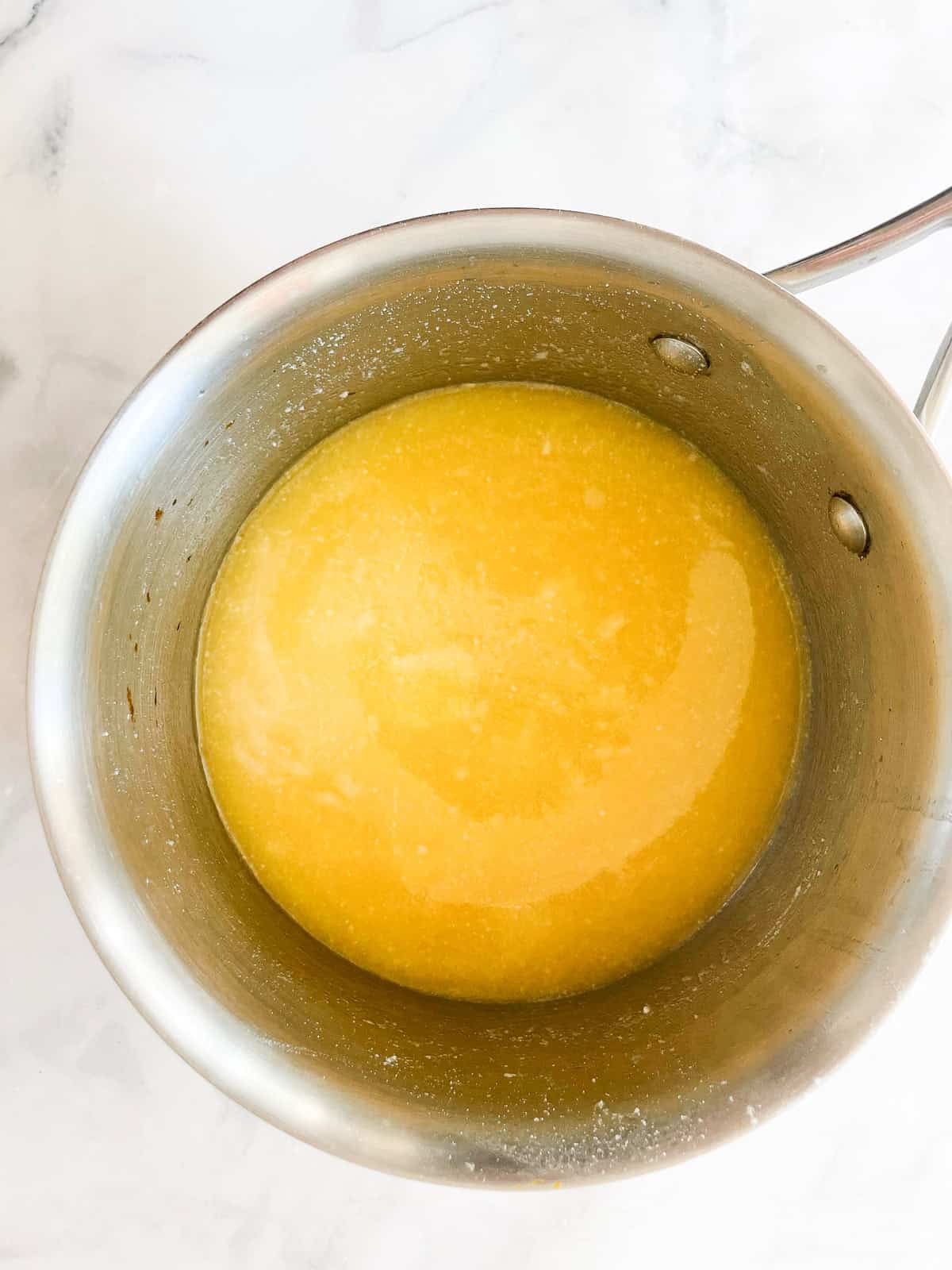 Easy gluten free gravy is an essential addition to the holiday table! Try this luxurious gravy on mashed potatoes, turkey, vegetarian dishes, and more. Broth added to gluten free gravy.