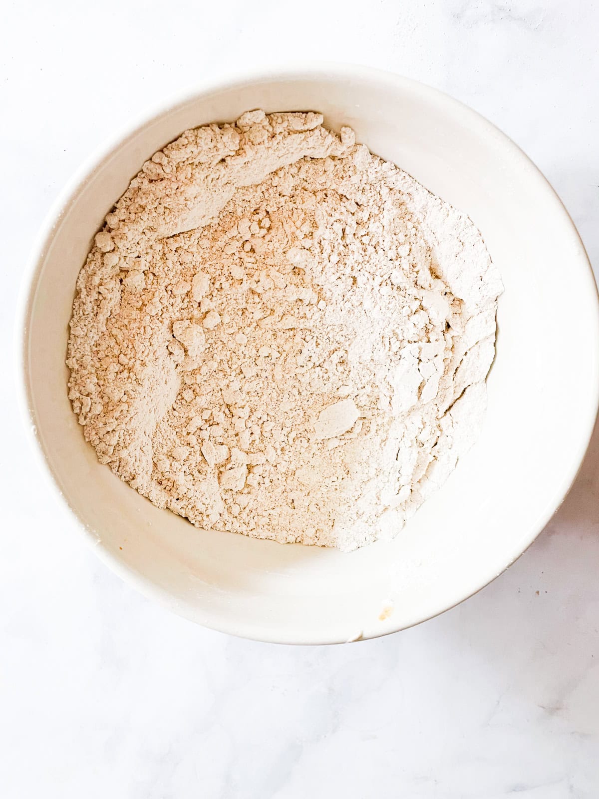 Dry mix for pumpkin bundt cake in a bowl.