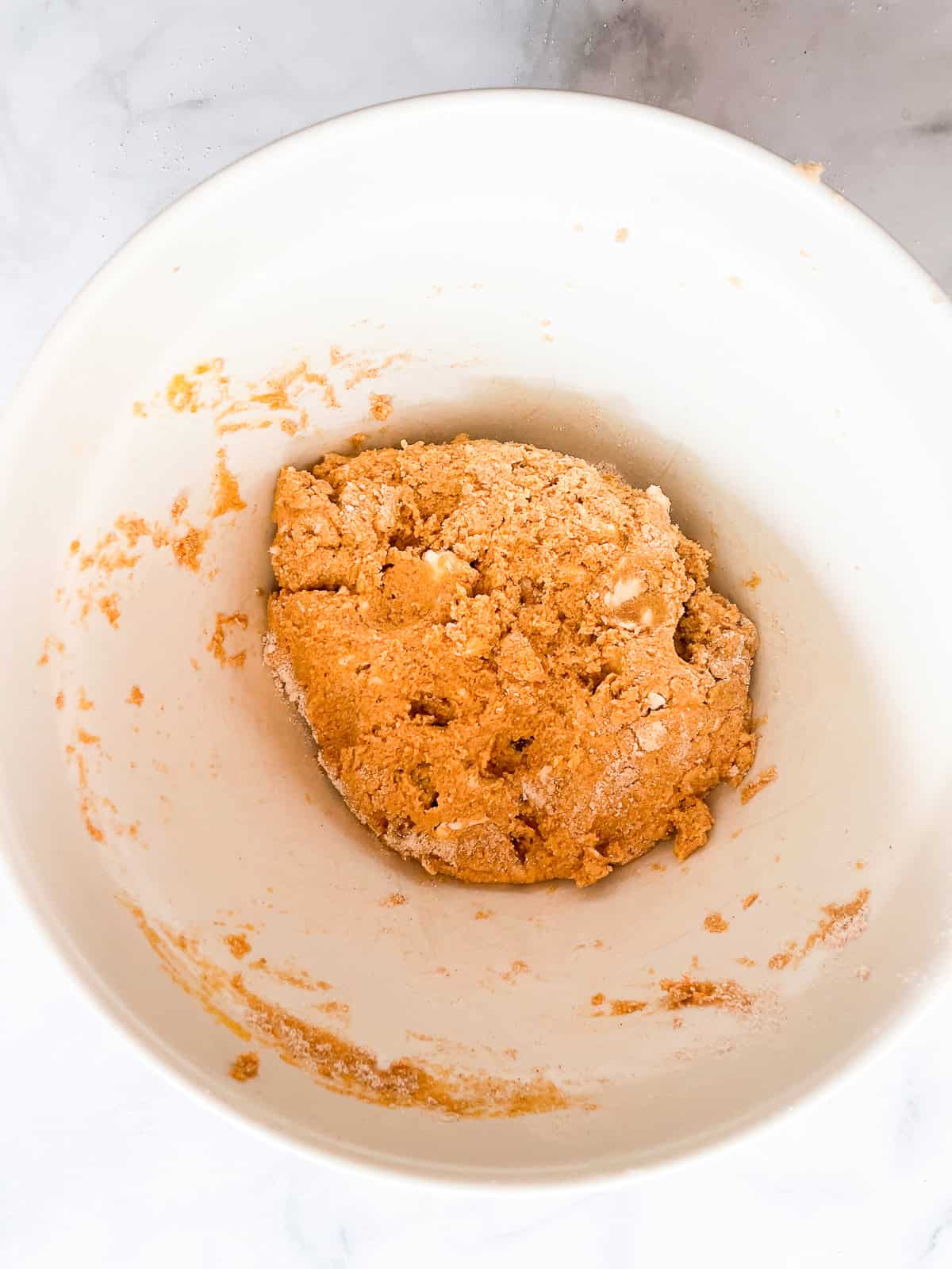 Gluten free walnut pumpkin scones dough in a bowl.