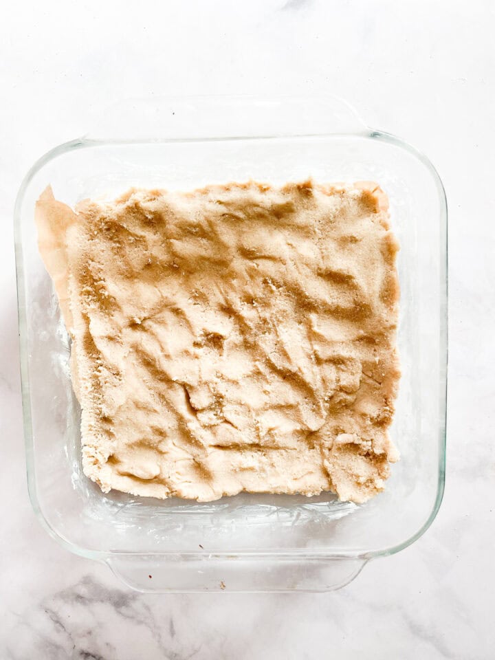 Maple shortbread dough in a pan.