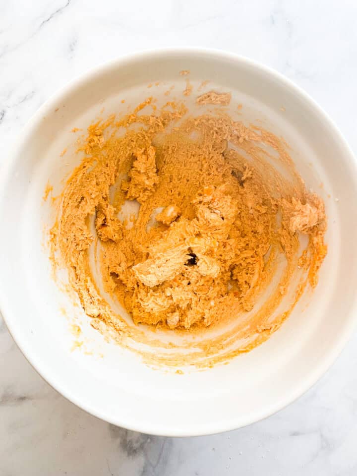 Sweet potato biscuits dough in a bowl.