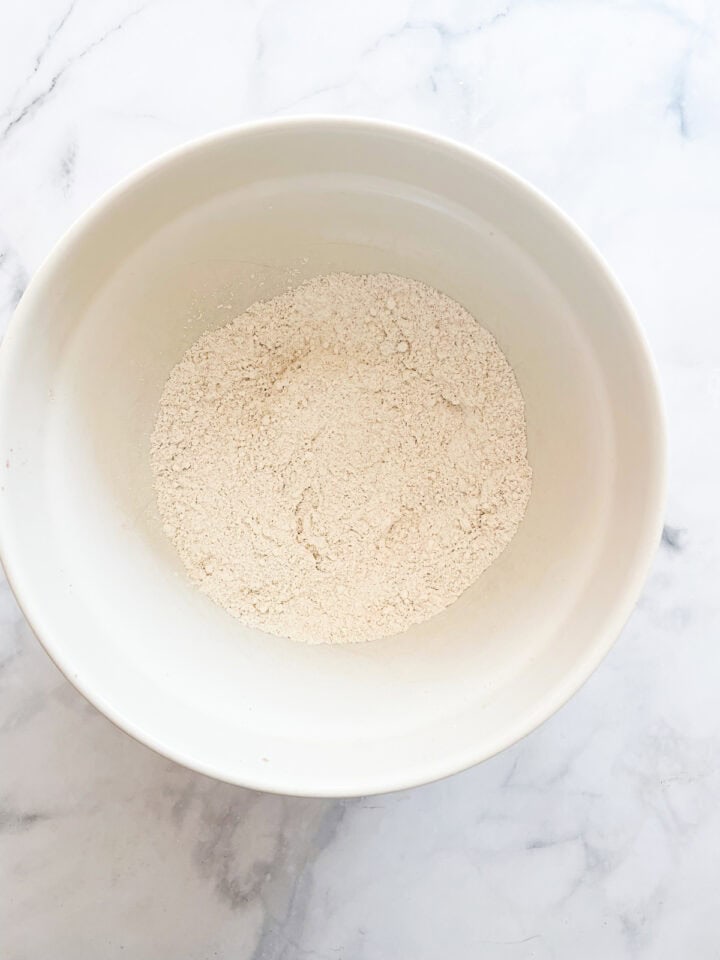 Dry mix for sweet potato biscuits in a bowl.