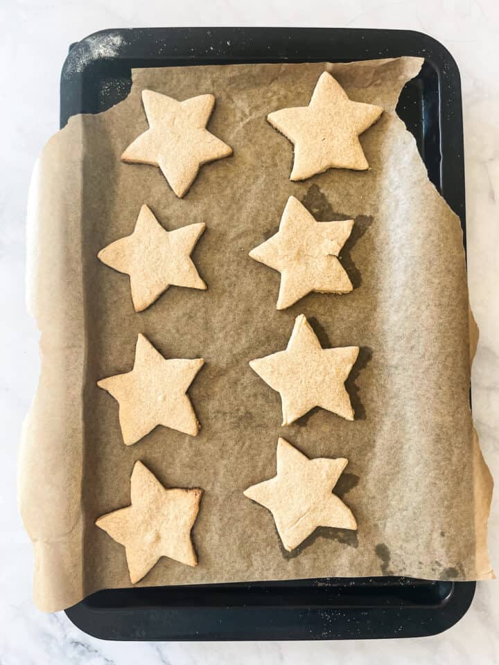 Sugar cookies on a baking sheet.