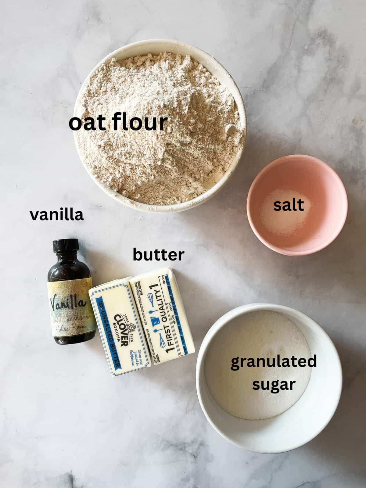 Ingredients for oat flour shortbread labeled and portioned.